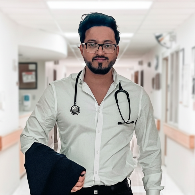 Doctor with a stethoscope in a hospital corridor